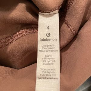 Lululemon leggings with a velvet stripe down the side.